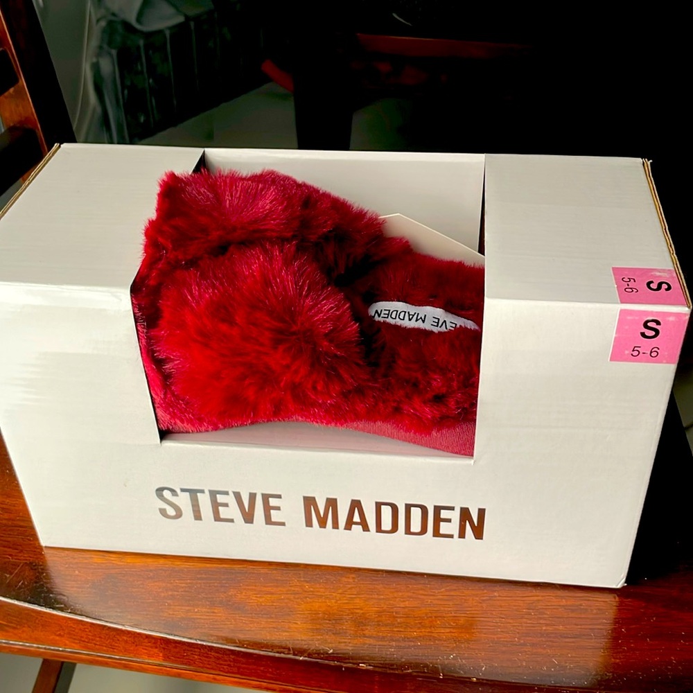 Red fuzzy slipper